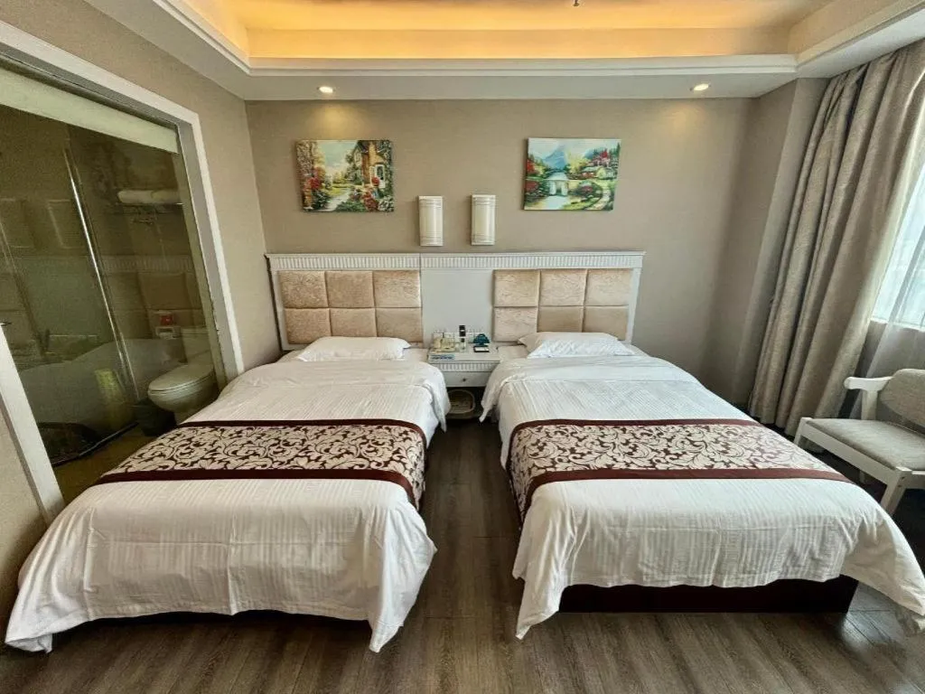 Bed in GreenTree Inn Guangdong Huizhou Chenjiang Intercity Rail Station Business Hotel