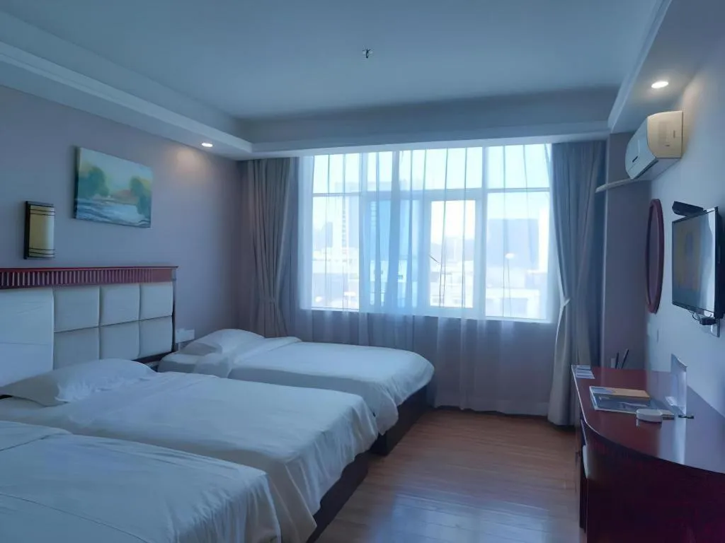 Bed in GreenTree Inn Guangdong Huizhou Chenjiang Intercity Rail Station Business Hotel
