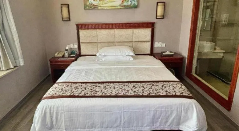 Bed in GreenTree Inn Guangdong Huizhou Chenjiang Intercity Rail Station Business Hotel
