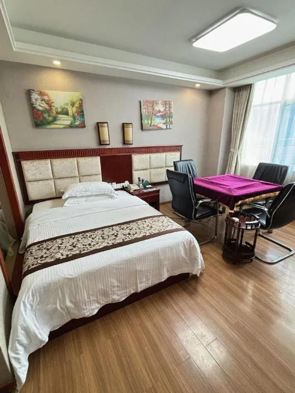 Bed in GreenTree Inn Guangdong Huizhou Chenjiang Intercity Rail Station Business Hotel