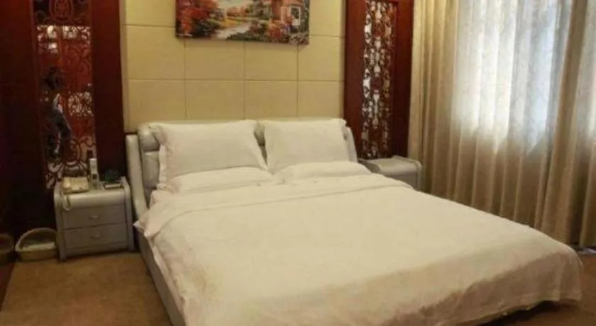 Bed in GreenTree Inn Guangdong Huizhou Chenjiang Intercity Rail Station Business Hotel