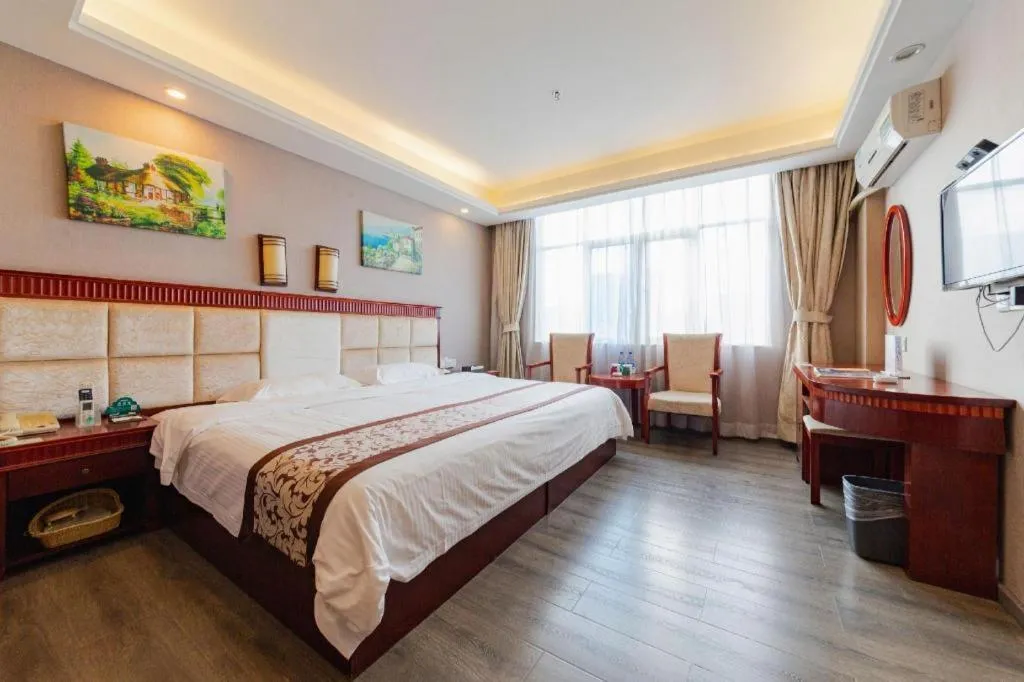 Bed in GreenTree Inn Guangdong Huizhou Chenjiang Intercity Rail Station Business Hotel