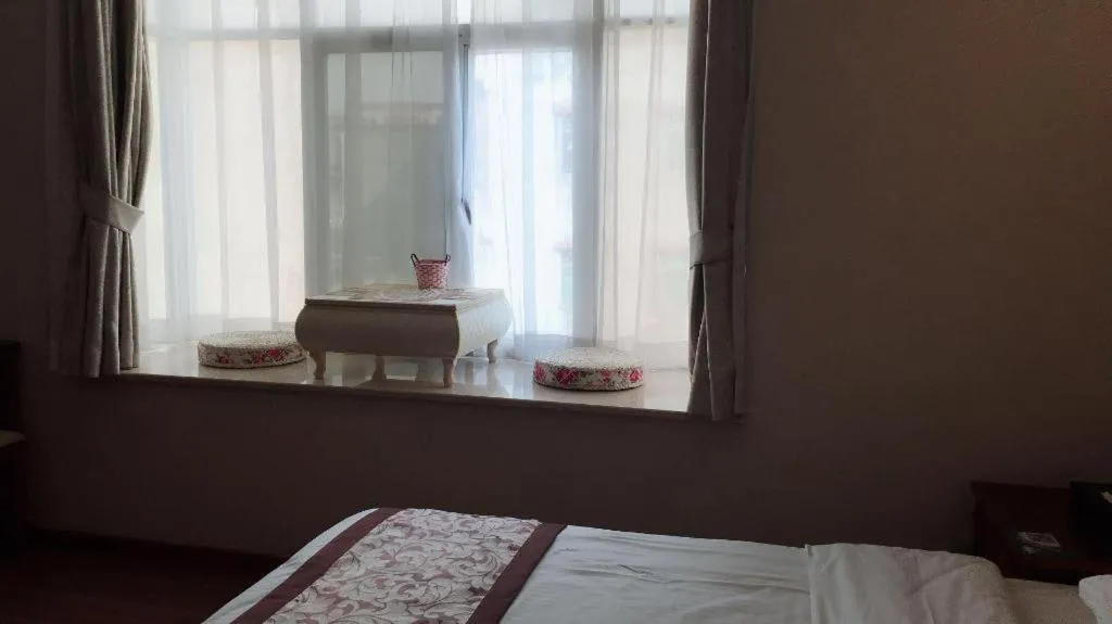 Bed in GreenTree Inn Guangdong Huizhou Chenjiang Intercity Rail Station Business Hotel