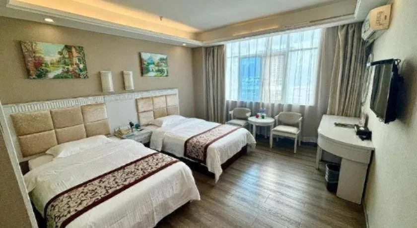 Bed in GreenTree Inn Guangdong Huizhou Chenjiang Intercity Rail Station Business Hotel