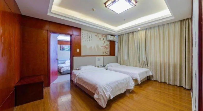 Bed in GreenTree Inn Guangdong Huizhou Chenjiang Intercity Rail Station Business Hotel