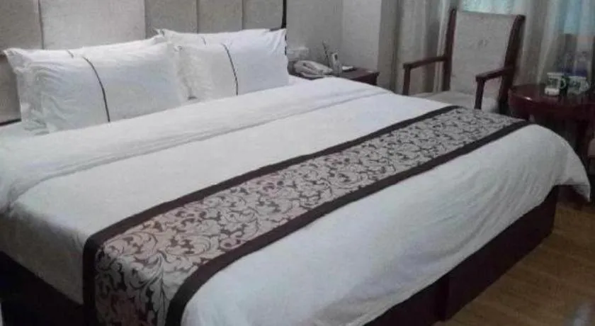 Bed in GreenTree Inn Guangdong Huizhou Chenjiang Intercity Rail Station Business Hotel