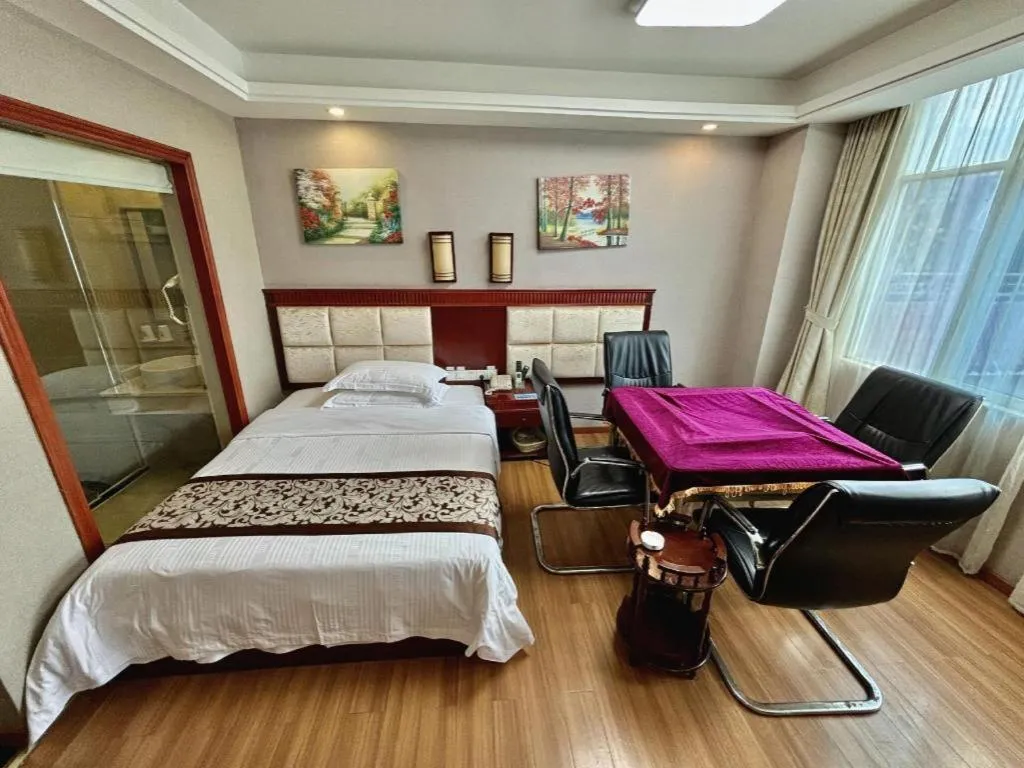 Bed in GreenTree Inn Guangdong Huizhou Chenjiang Intercity Rail Station Business Hotel