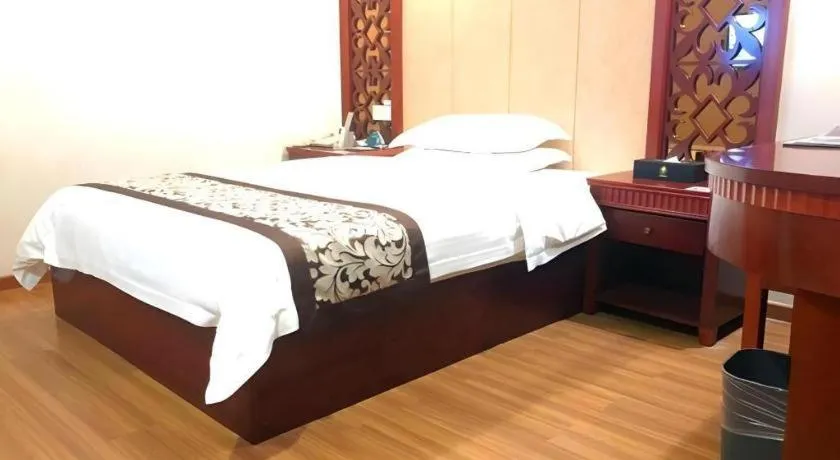 Bed in GreenTree Inn Guangdong Huizhou Chenjiang Intercity Rail Station Business Hotel