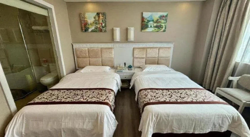 Bed in GreenTree Inn Guangdong Huizhou Chenjiang Intercity Rail Station Business Hotel