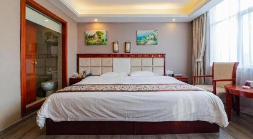 Bed in GreenTree Inn Guangdong Huizhou Chenjiang Intercity Rail Station Business Hotel