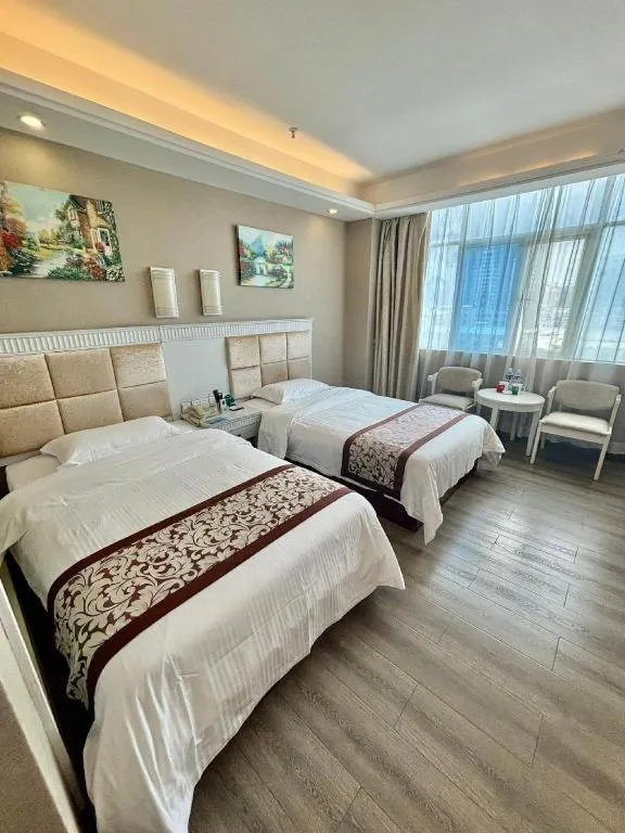 Bed in GreenTree Inn Guangdong Huizhou Chenjiang Intercity Rail Station Business Hotel