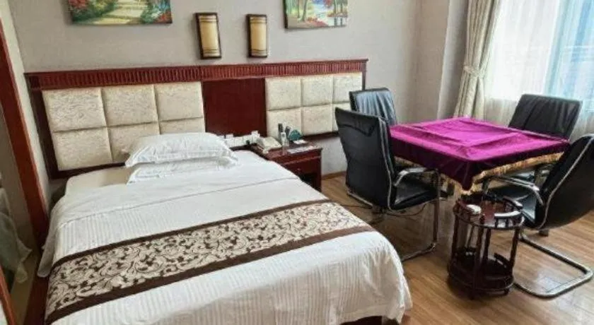 Bed in GreenTree Inn Guangdong Huizhou Chenjiang Intercity Rail Station Business Hotel