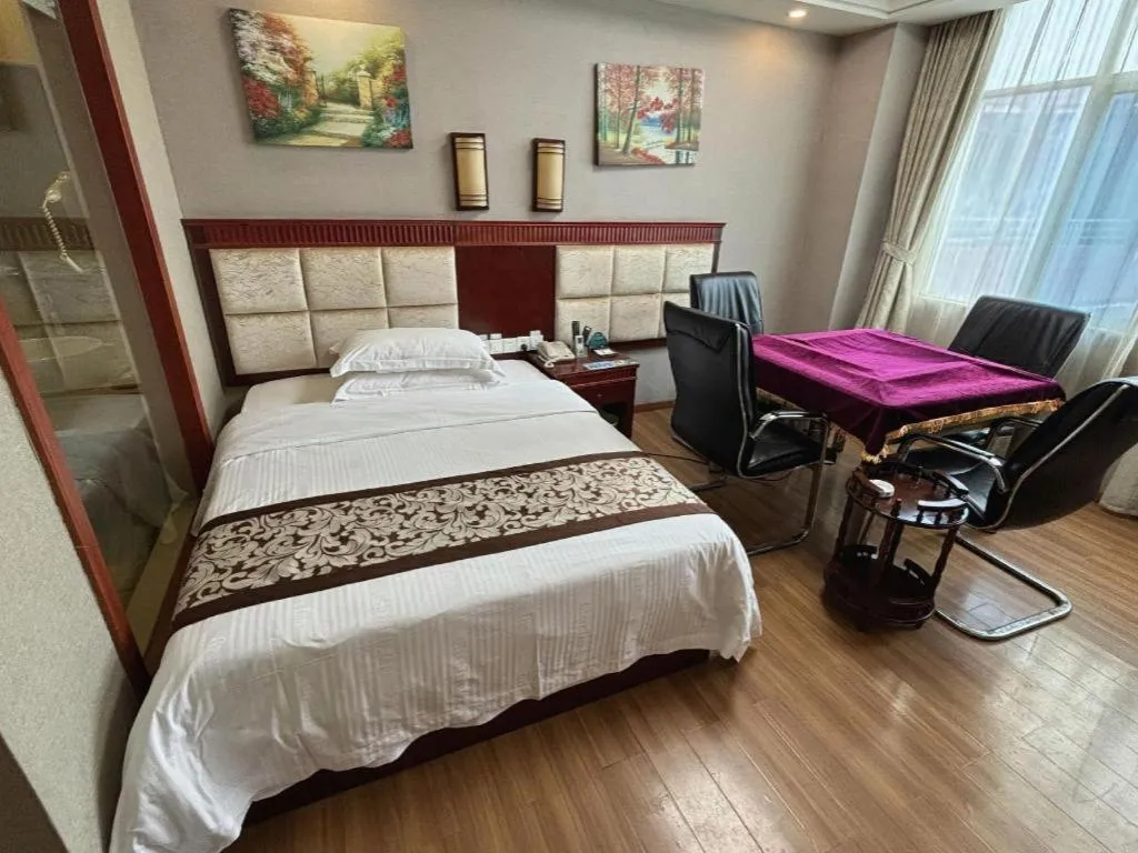 Bed in GreenTree Inn Guangdong Huizhou Chenjiang Intercity Rail Station Business Hotel