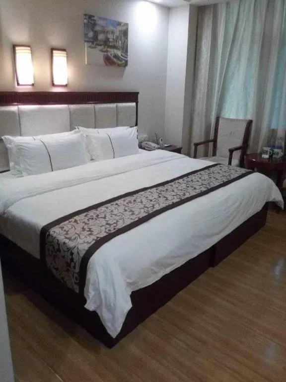 Bed in GreenTree Inn Guangdong Huizhou Chenjiang Intercity Rail Station Business Hotel