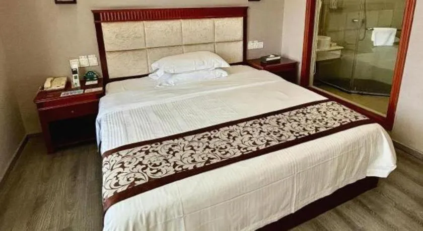 Bed in GreenTree Inn Guangdong Huizhou Chenjiang Intercity Rail Station Business Hotel