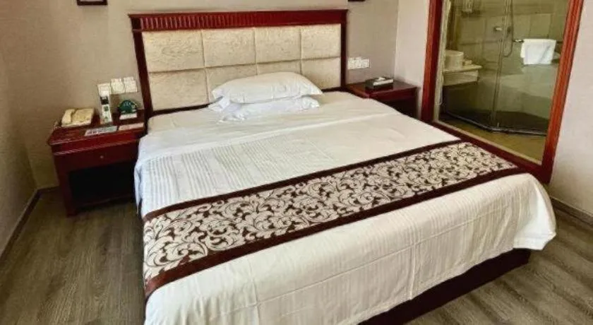 Bed in GreenTree Inn Guangdong Huizhou Chenjiang Intercity Rail Station Business Hotel