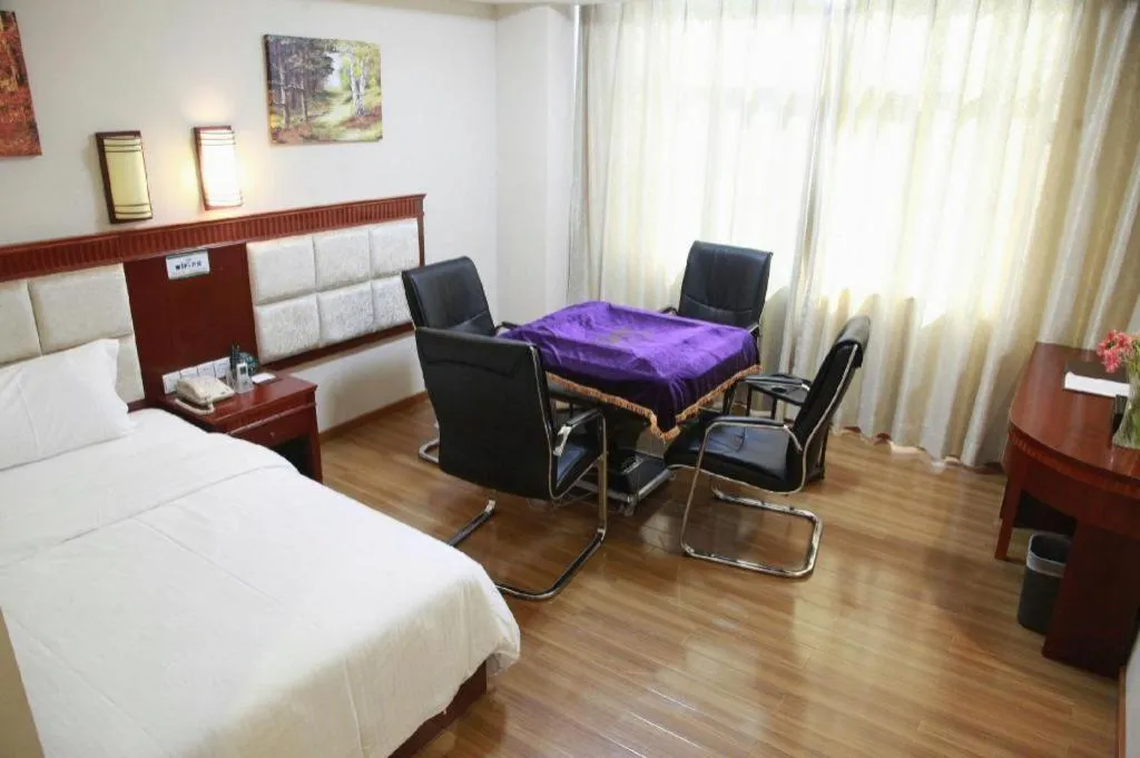 Bed in GreenTree Inn Guangdong Huizhou Chenjiang Intercity Rail Station Business Hotel