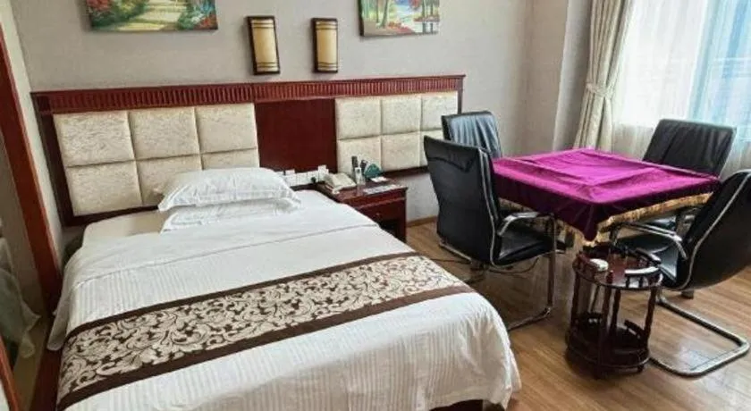 Bed in GreenTree Inn Guangdong Huizhou Chenjiang Intercity Rail Station Business Hotel