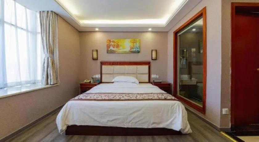 Bed in GreenTree Inn Guangdong Huizhou Chenjiang Intercity Rail Station Business Hotel
