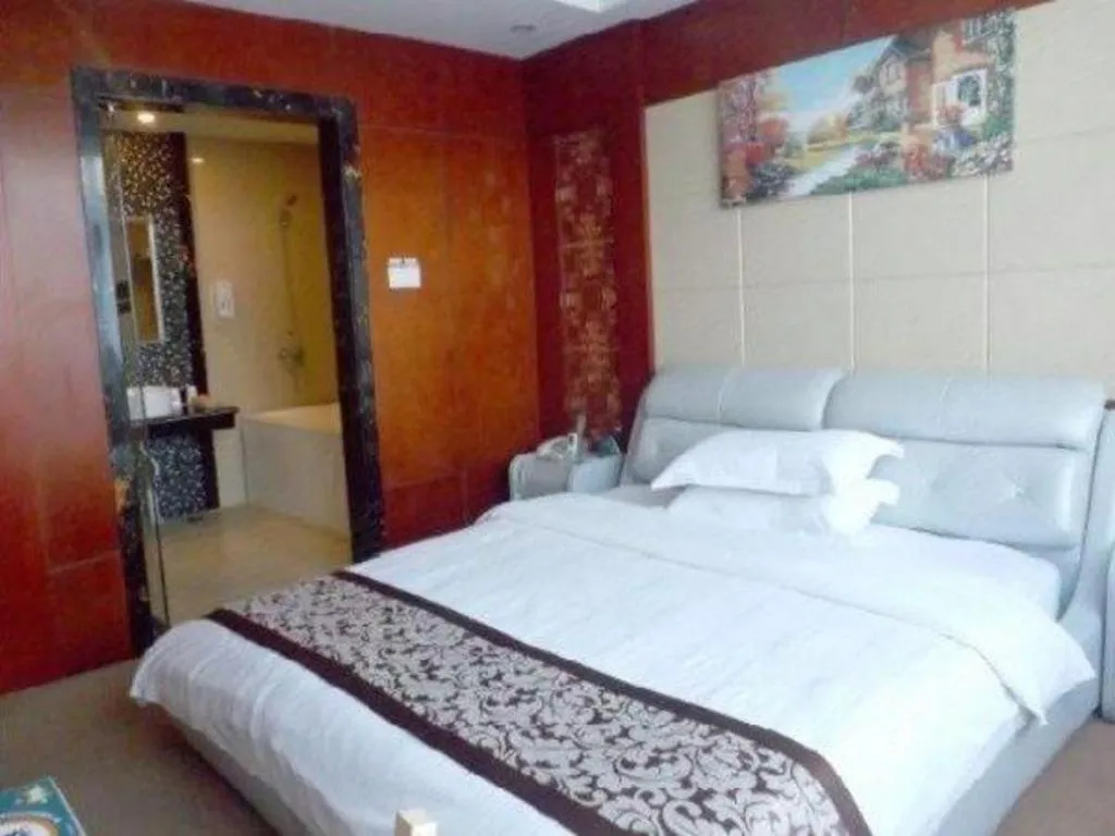 Bed in GreenTree Inn Guangdong Huizhou Chenjiang Intercity Rail Station Business Hotel