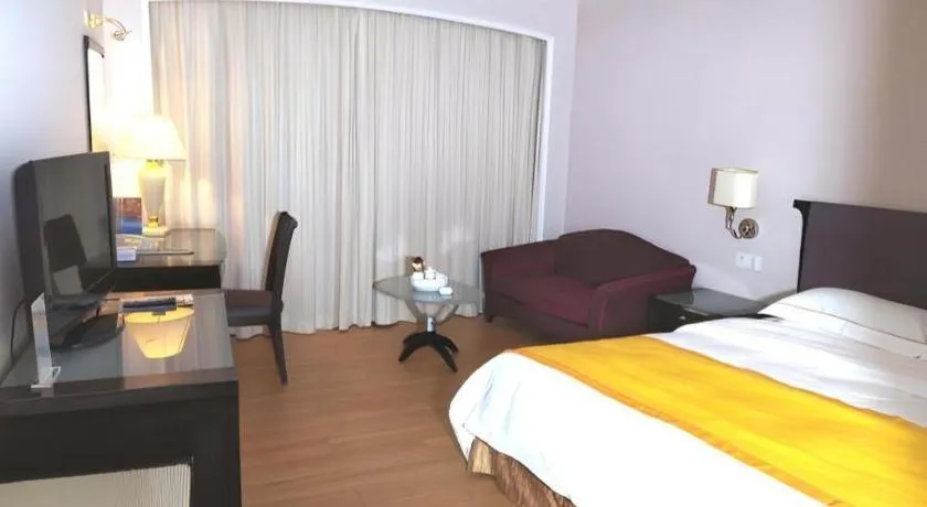 Bed in Shantou Golden Gulf Hotel