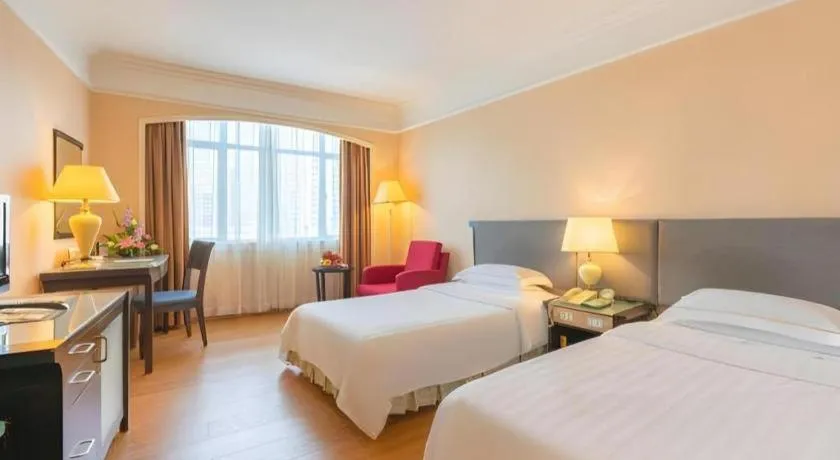 Bed in Shantou Golden Gulf Hotel