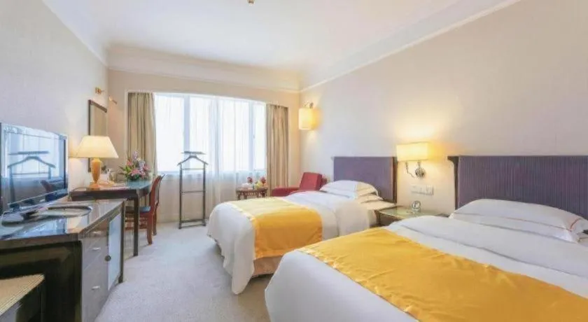 Bed in Shantou Golden Gulf Hotel