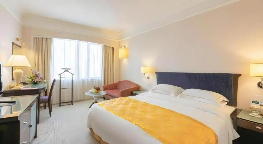 Bed in Shantou Golden Gulf Hotel