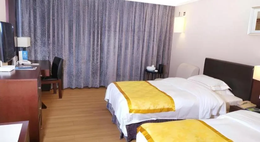 Bed in Shantou Golden Gulf Hotel