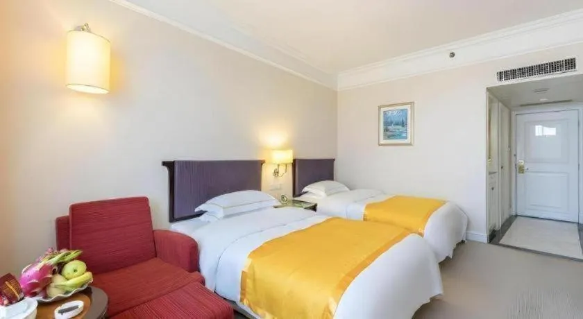 Bed in Shantou Golden Gulf Hotel