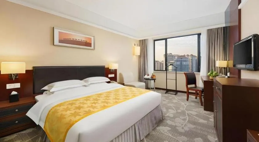 Bed in Shantou Golden Gulf Hotel