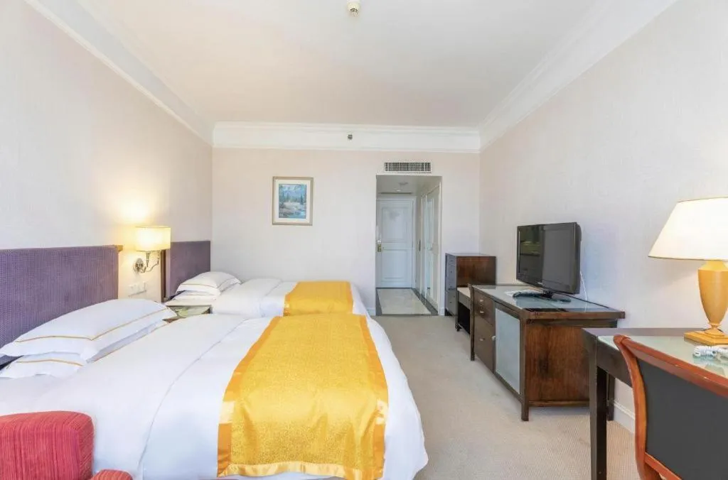 Bed in Shantou Golden Gulf Hotel