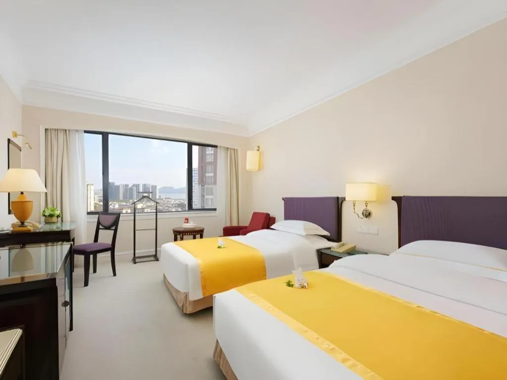 Bed in Shantou Golden Gulf Hotel