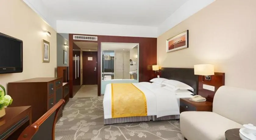 Bed in Shantou Golden Gulf Hotel