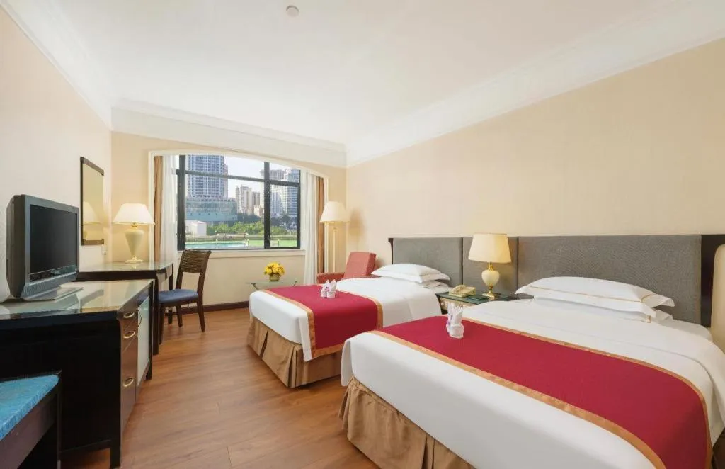 Bed in Shantou Golden Gulf Hotel