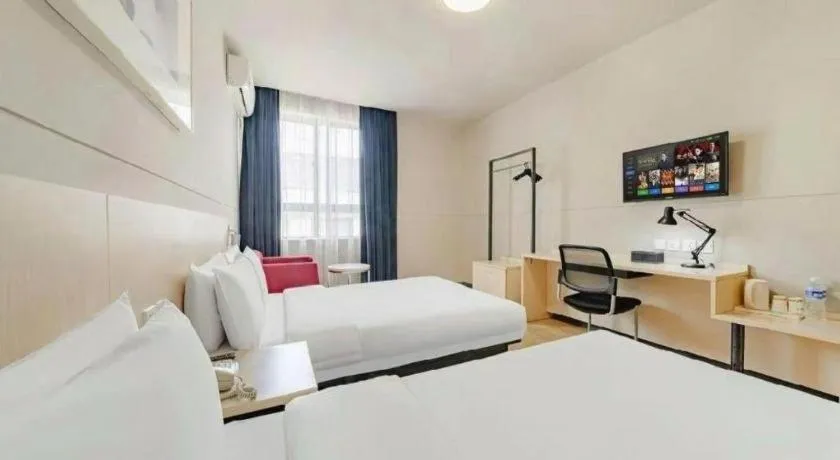 Bed in Jinjiang Inn Zhenjiang Jiangsu University Suning Plaza