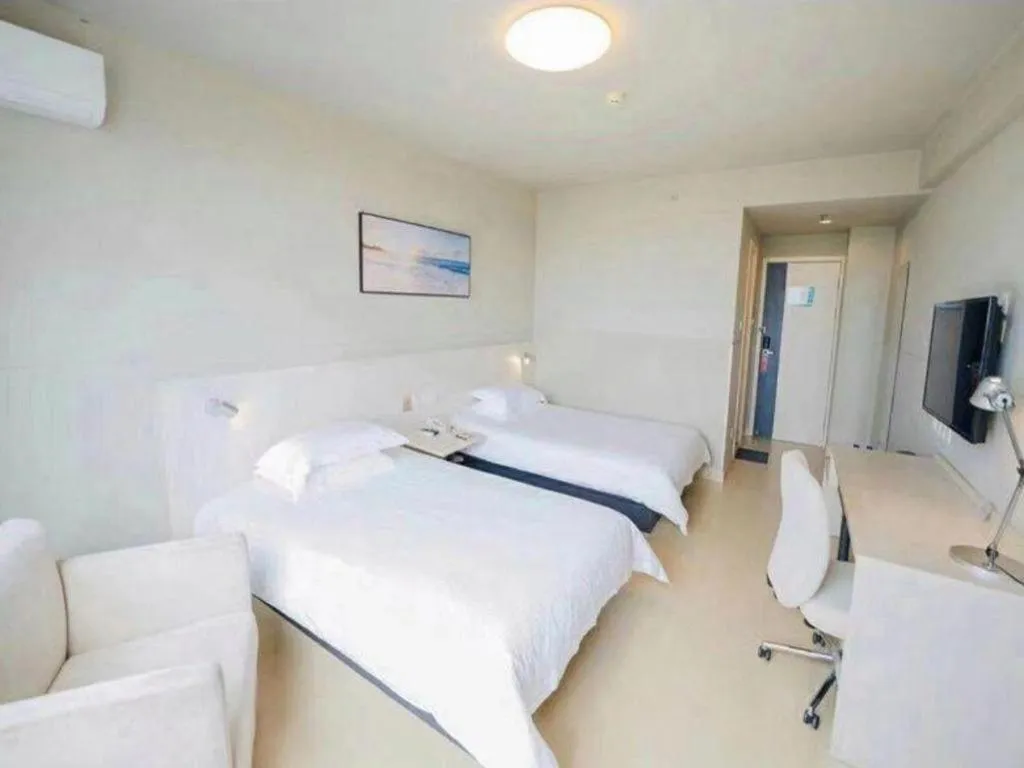 Bed in Jinjiang Inn Zhenjiang Jiangsu University Suning Plaza