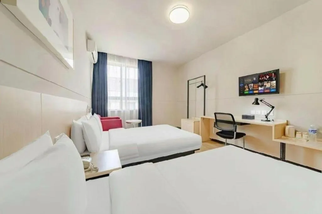 Bed in Jinjiang Inn Zhenjiang Jiangsu University Suning Plaza