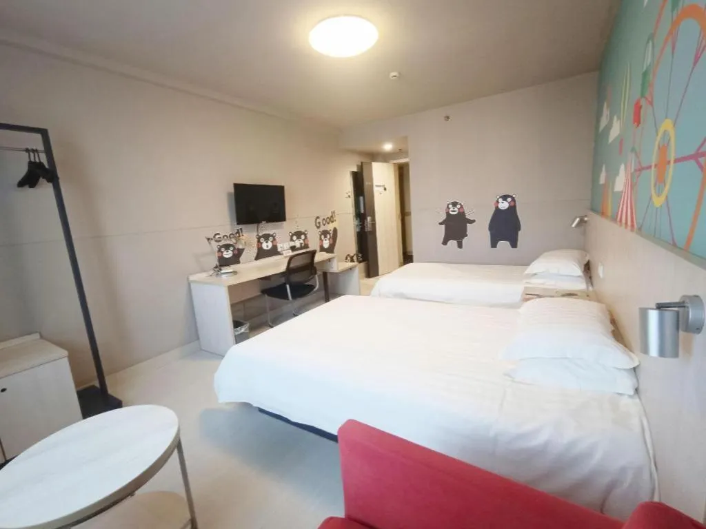 Bed in Jinjiang Inn Zhenjiang Jiangsu University Suning Plaza