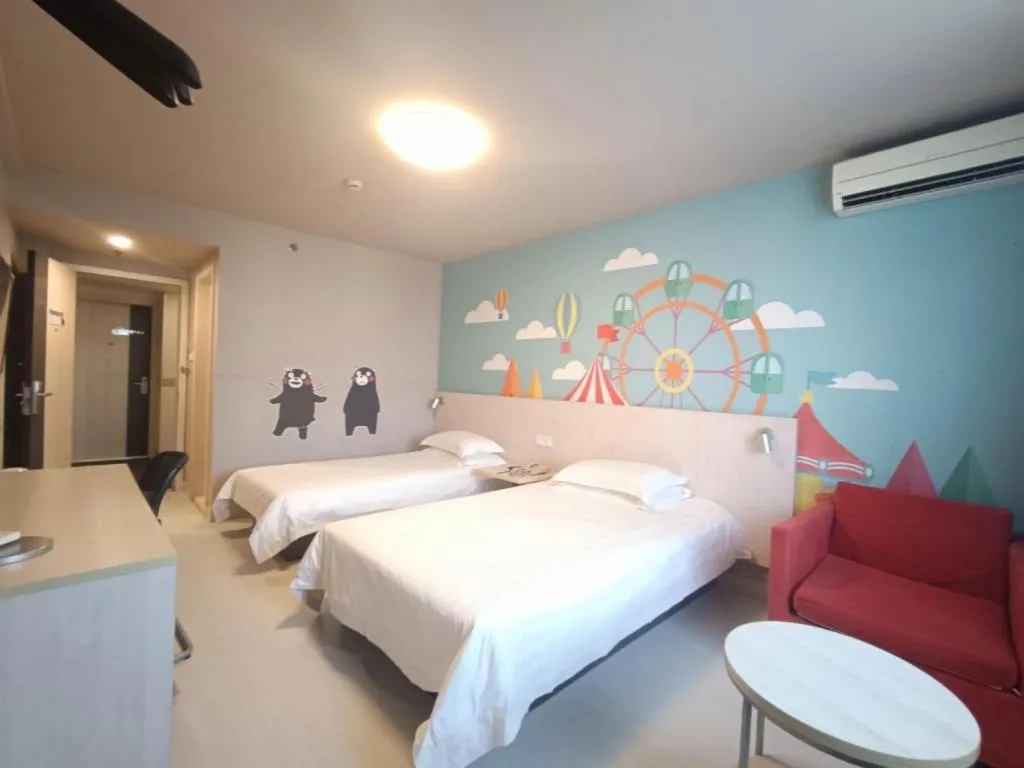 Bed in Jinjiang Inn Zhenjiang Jiangsu University Suning Plaza