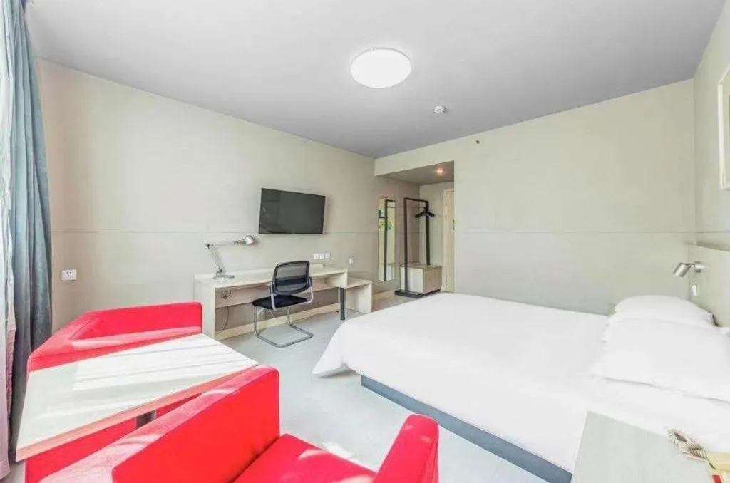 Bed in Jinjiang Inn Zhenjiang Jiangsu University Suning Plaza