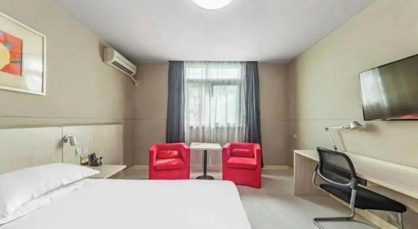 Bed in Jinjiang Inn Zhenjiang Jiangsu University Suning Plaza