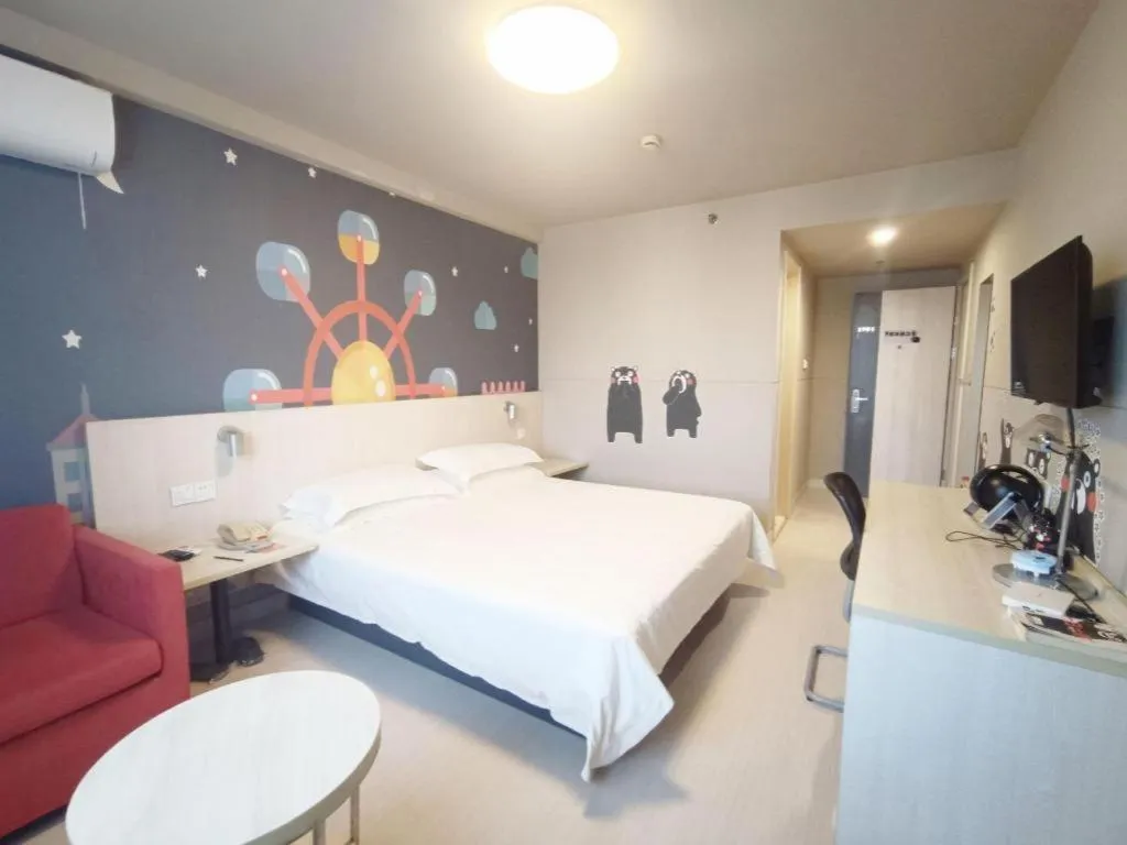 Bed in Jinjiang Inn Zhenjiang Jiangsu University Suning Plaza