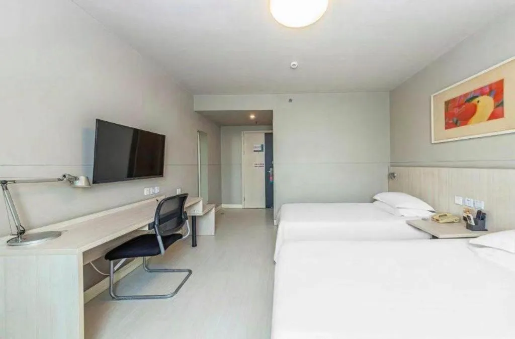 Bed in Jinjiang Inn Zhenjiang Jiangsu University Suning Plaza