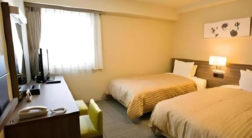 Bed in Spa Land Hotel Naito