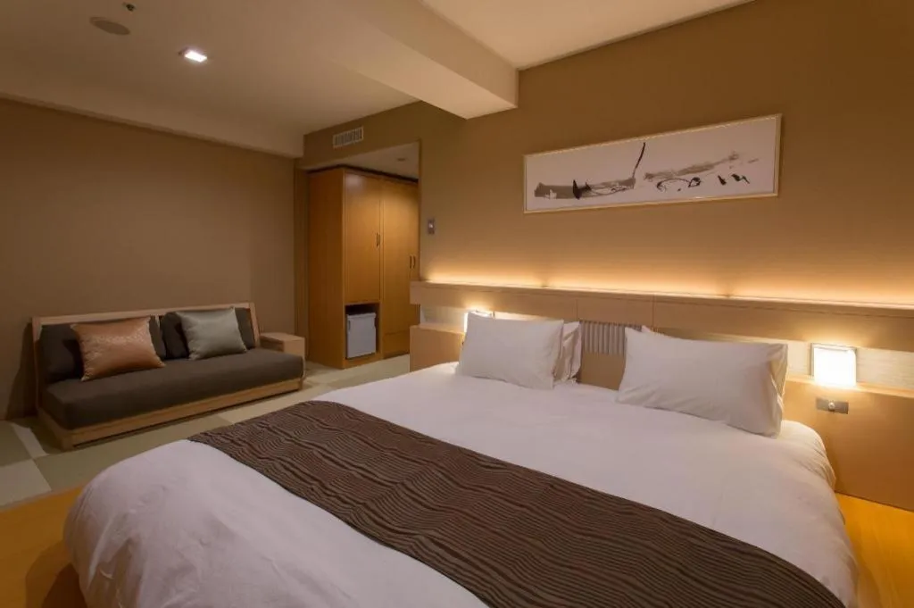 Bed in Spa Land Hotel Naito