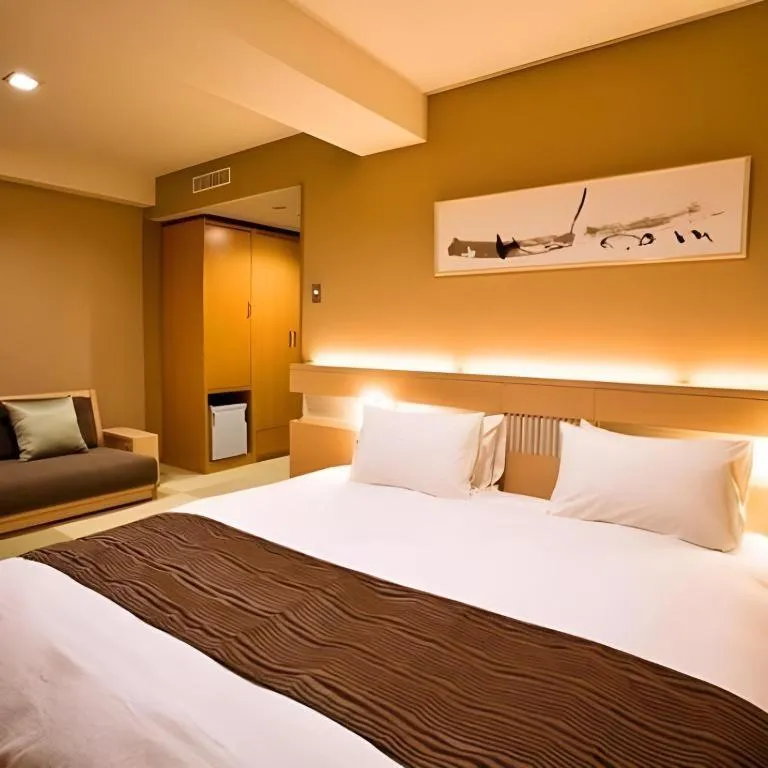 Bed in Spa Land Hotel Naito