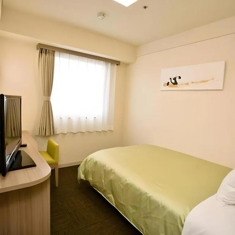 Bed in Spa Land Hotel Naito