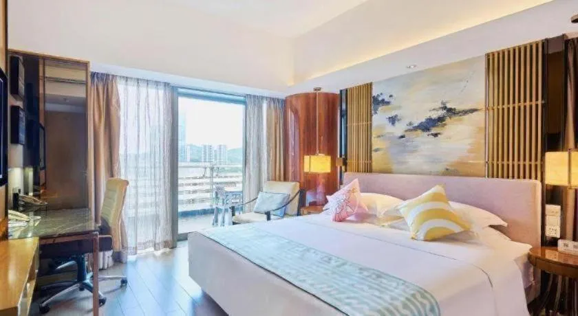 Bed in Huafa Executive Apartment Hotel Zhuhai