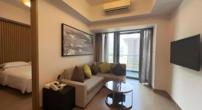 Bed in Huafa Executive Apartment Hotel Zhuhai